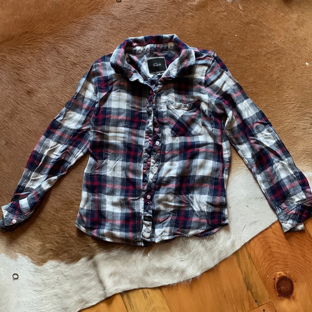 Red white and blue flannel with pocket in the left side of the chest
